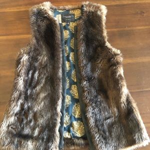 Leather trim fur vest